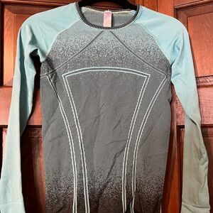 Girls iviva top size teql and black size 12
